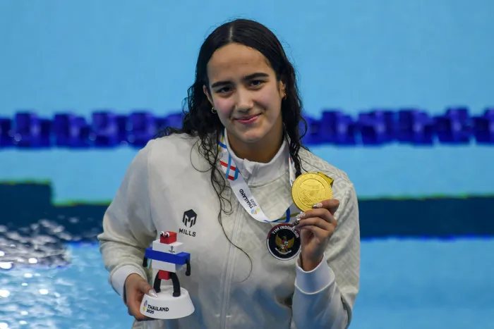 Perenang putri Indonesia, Masniari Wolf, meraih medali emas SEA Games 2025 Thailand. (Istimewa/Wawasannews) 