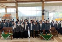 foto bersama peserta dan pengurus PW IPNU IPPNU usai pembukaan Turba Bimtek Sipadu dan Penguatan Tim Penggerak Komisariat di Gedung Muslimat NU Wonosobo, Minggu (14/12/2025). Dok pribadi. (Wawasannews)