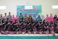 Jajaran Polres Kendal bersama Bhayangkari, GP Ansor Patebon, serta pengurus Panti Asuhan Darul Hadlonah berfoto bersama usai penyerahan takjil dan bantuan sembako kepada para santri di Desa Jambearum, Kecamatan Patebon, Selasa (3/3/2026). Foto : Wawasannews