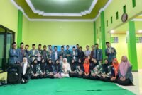 Jajaran pengurus dan anggota PAC IPNU–IPPNU Kecamatan Tirto bersama perwakilan pimpinan ranting berfoto bersama usai pelaksanaan RAPIMANCAB II di Aula MWC NU Kecamatan Tirto, Ahad (15/3/2026). Foto : Wawasannews.com