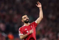Penyerang sayap Liverpool Mohamed Salah merayakan keberhasilannya mencetak gol ke gawang Galatasaray pada pertandingan leg kedua babak 16 besar Liga Champions di Stadion Anfield, Liverpool, Rabu (18/3/2026). (Istimewa/Wawasannews)